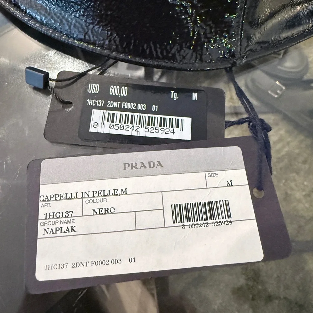 Prada 1HC137 100% cotton bucket hat with embroidered white stitch logo